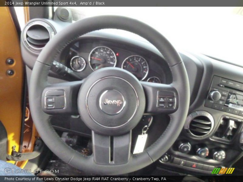 Amp'd / Black 2014 Jeep Wrangler Unlimited Sport 4x4