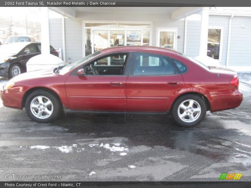 Matador Red Metallic / Dark Charcoal 2002 Ford Taurus SE