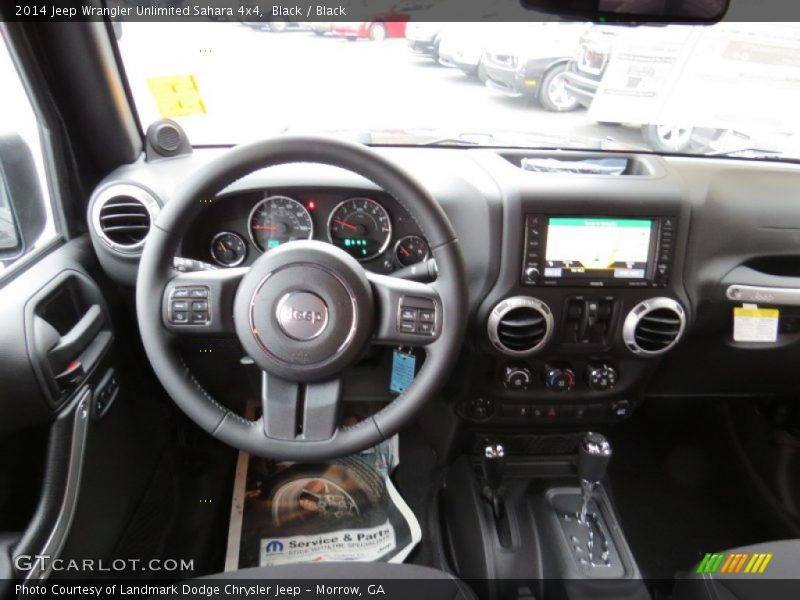 Black / Black 2014 Jeep Wrangler Unlimited Sahara 4x4