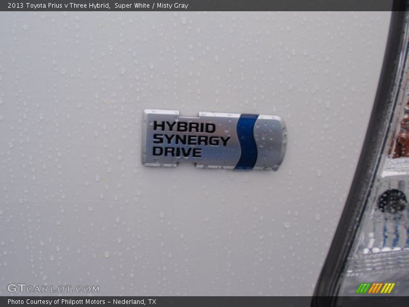  2013 Prius v Three Hybrid Logo