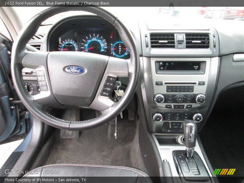 Blue Flame Metallic / Charcoal Black 2012 Ford Fusion SEL