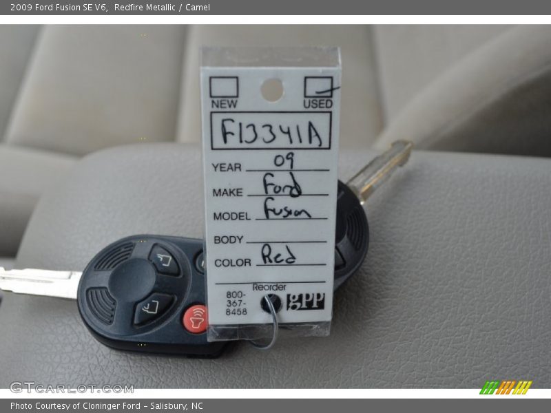 Redfire Metallic / Camel 2009 Ford Fusion SE V6