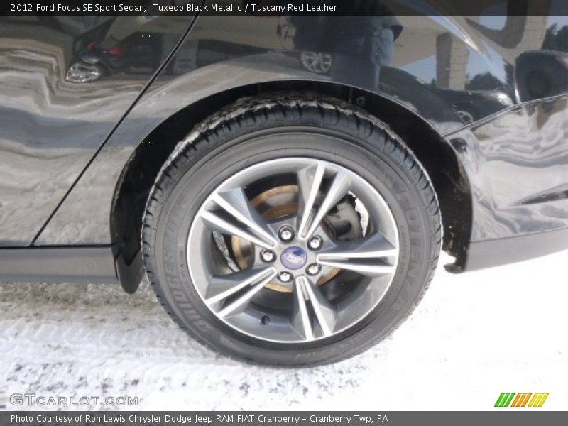 Tuxedo Black Metallic / Tuscany Red Leather 2012 Ford Focus SE Sport Sedan