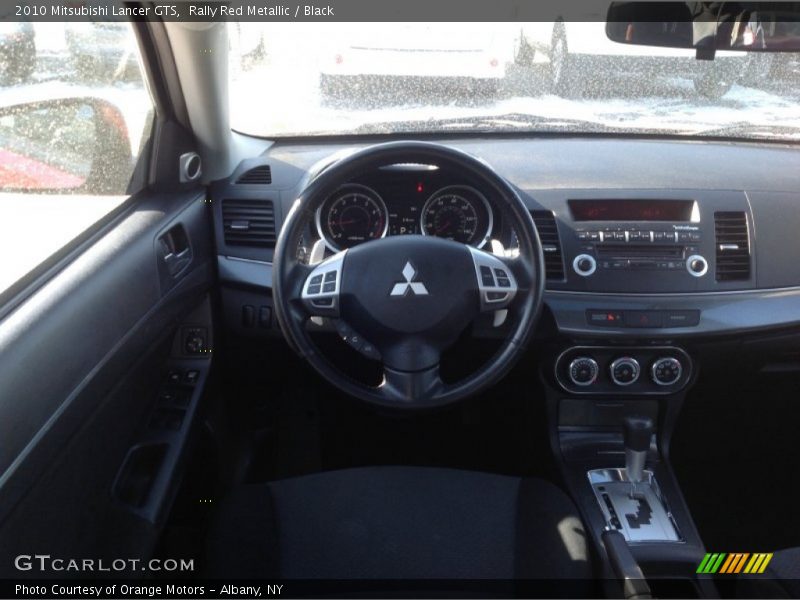 Rally Red Metallic / Black 2010 Mitsubishi Lancer GTS