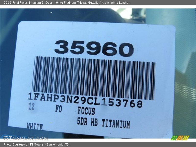 White Platinum Tricoat Metallic / Arctic White Leather 2012 Ford Focus Titanium 5-Door