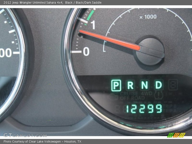 Black / Black/Dark Saddle 2012 Jeep Wrangler Unlimited Sahara 4x4