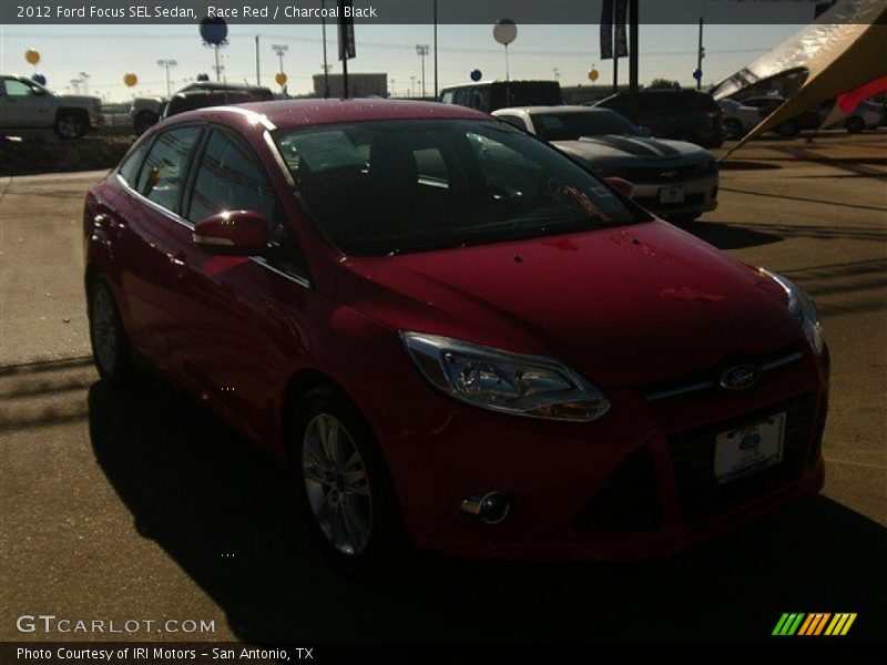 Race Red / Charcoal Black 2012 Ford Focus SEL Sedan