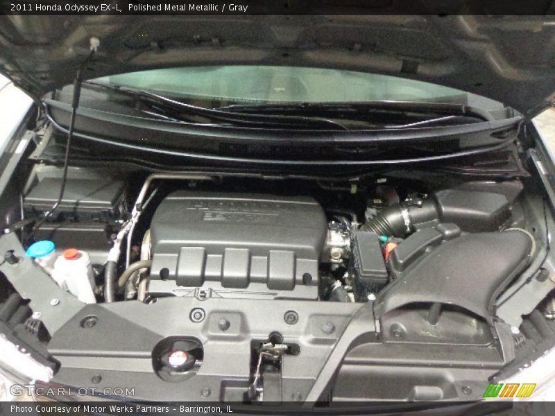 Polished Metal Metallic / Gray 2011 Honda Odyssey EX-L
