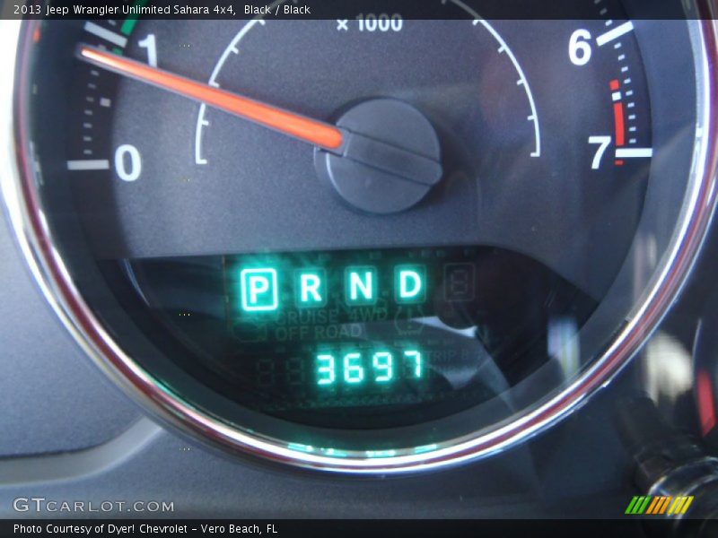 Black / Black 2013 Jeep Wrangler Unlimited Sahara 4x4