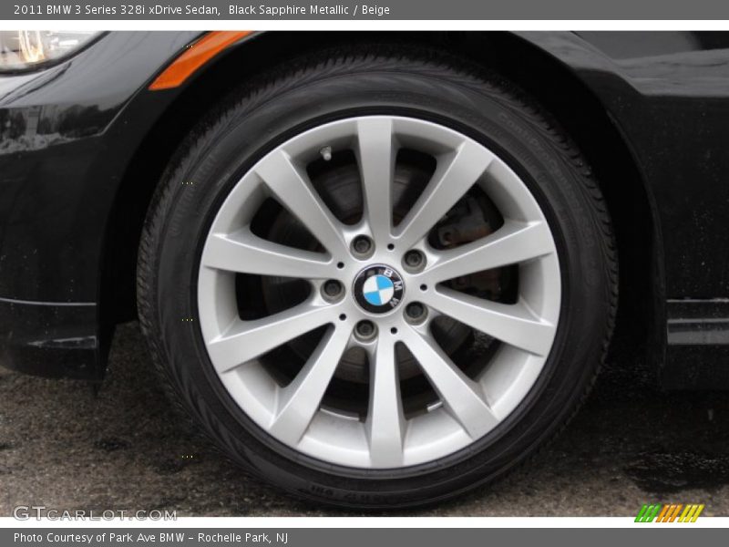 Black Sapphire Metallic / Beige 2011 BMW 3 Series 328i xDrive Sedan