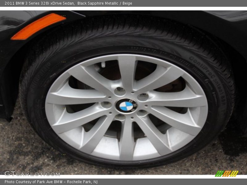 Black Sapphire Metallic / Beige 2011 BMW 3 Series 328i xDrive Sedan