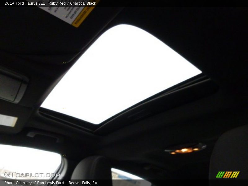 Ruby Red / Charcoal Black 2014 Ford Taurus SEL