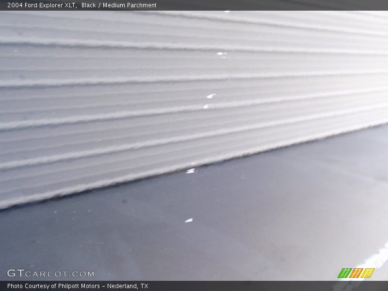 Black / Medium Parchment 2004 Ford Explorer XLT