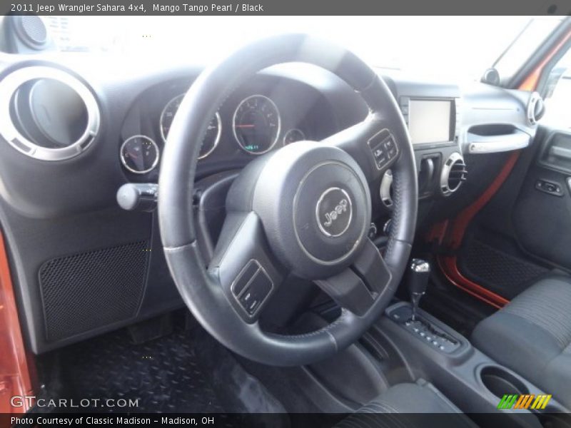 Mango Tango Pearl / Black 2011 Jeep Wrangler Sahara 4x4