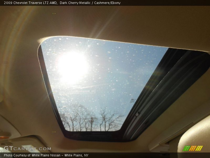 Dark Cherry Metallic / Cashmere/Ebony 2009 Chevrolet Traverse LTZ AWD