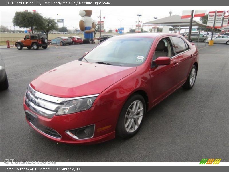 Red Candy Metallic / Medium Light Stone 2011 Ford Fusion SEL