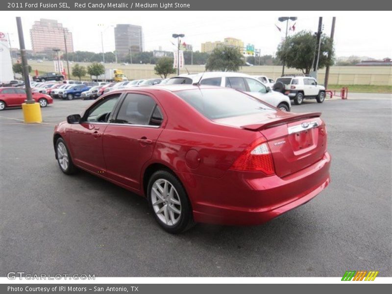 Red Candy Metallic / Medium Light Stone 2011 Ford Fusion SEL