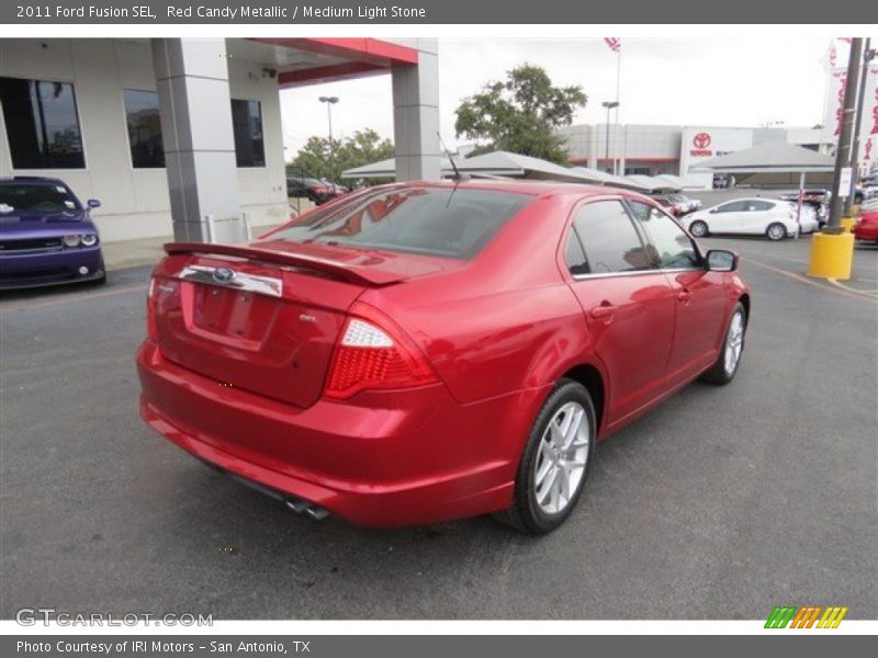 Red Candy Metallic / Medium Light Stone 2011 Ford Fusion SEL