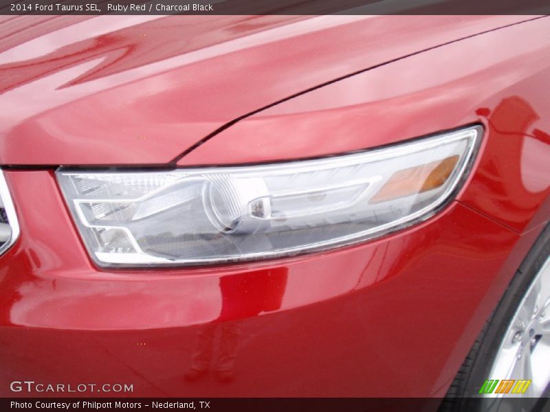 Ruby Red / Charcoal Black 2014 Ford Taurus SEL