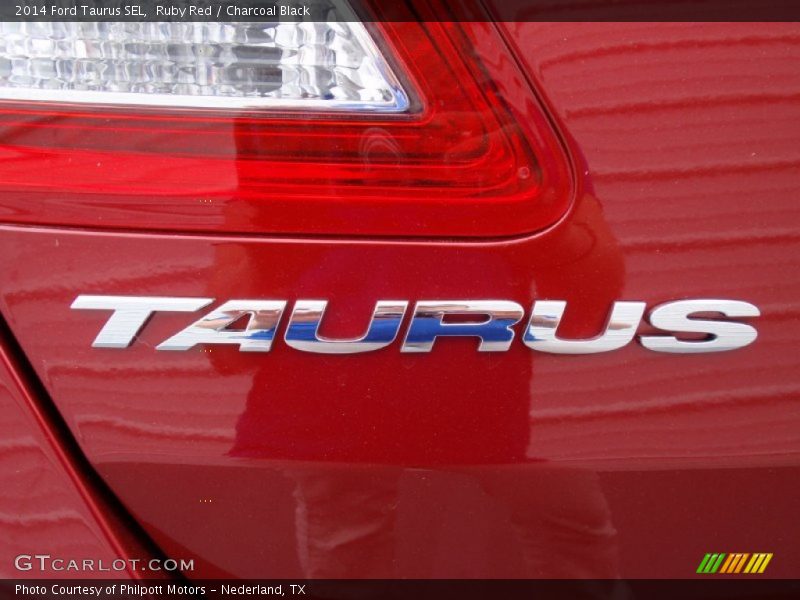 Ruby Red / Charcoal Black 2014 Ford Taurus SEL