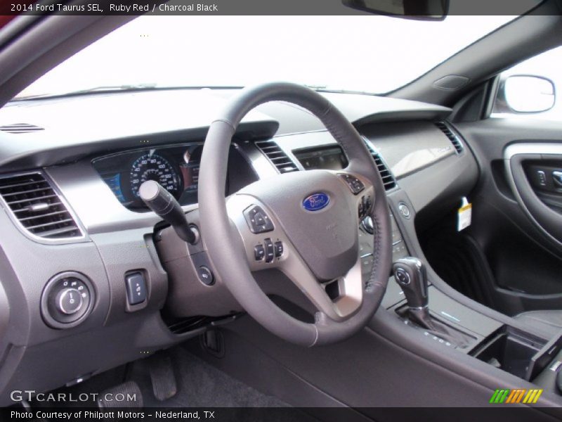 Ruby Red / Charcoal Black 2014 Ford Taurus SEL
