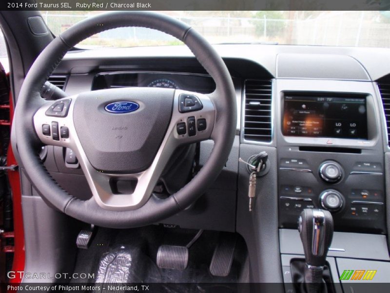 Ruby Red / Charcoal Black 2014 Ford Taurus SEL