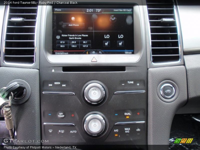 Ruby Red / Charcoal Black 2014 Ford Taurus SEL