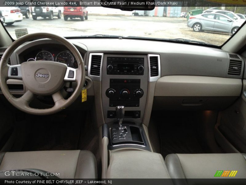 Brilliant Black Crystal Pearl / Medium Khaki/Dark Khaki 2009 Jeep Grand Cherokee Laredo 4x4