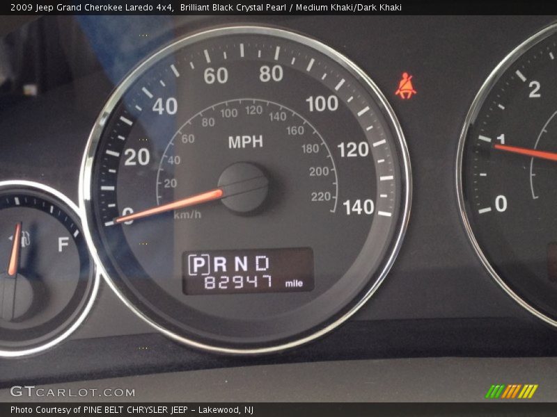 Brilliant Black Crystal Pearl / Medium Khaki/Dark Khaki 2009 Jeep Grand Cherokee Laredo 4x4