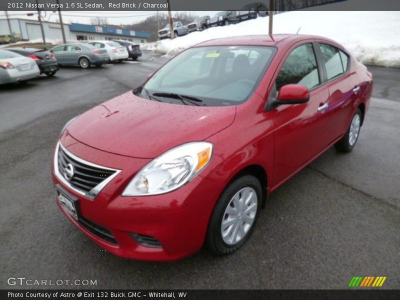 Red Brick / Charcoal 2012 Nissan Versa 1.6 SL Sedan