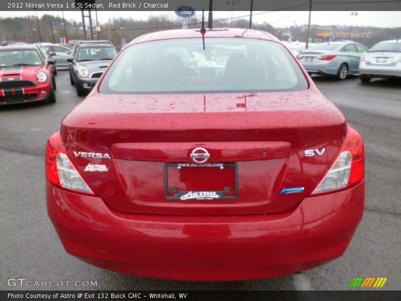 Red Brick / Charcoal 2012 Nissan Versa 1.6 SL Sedan