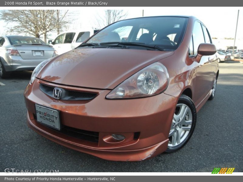 Blaze Orange Metallic / Black/Grey 2008 Honda Fit Sport