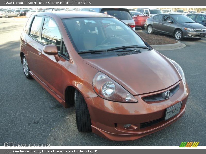Blaze Orange Metallic / Black/Grey 2008 Honda Fit Sport