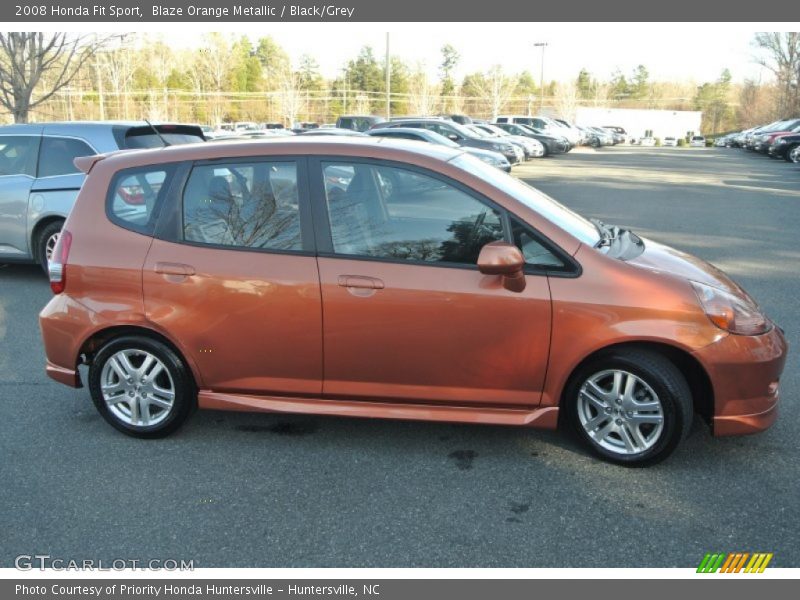 Blaze Orange Metallic / Black/Grey 2008 Honda Fit Sport