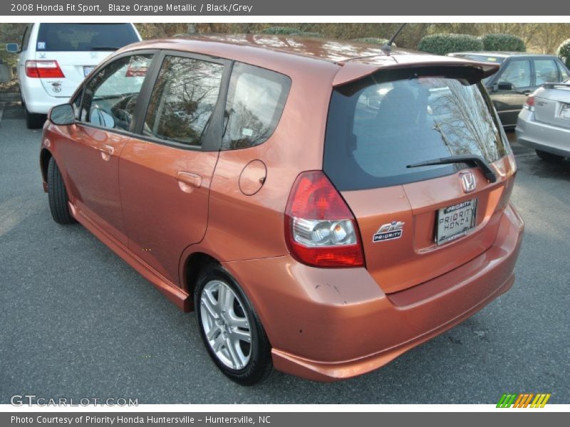 Blaze Orange Metallic / Black/Grey 2008 Honda Fit Sport