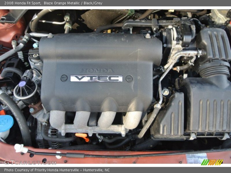 Blaze Orange Metallic / Black/Grey 2008 Honda Fit Sport