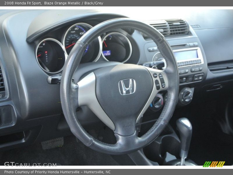 Blaze Orange Metallic / Black/Grey 2008 Honda Fit Sport