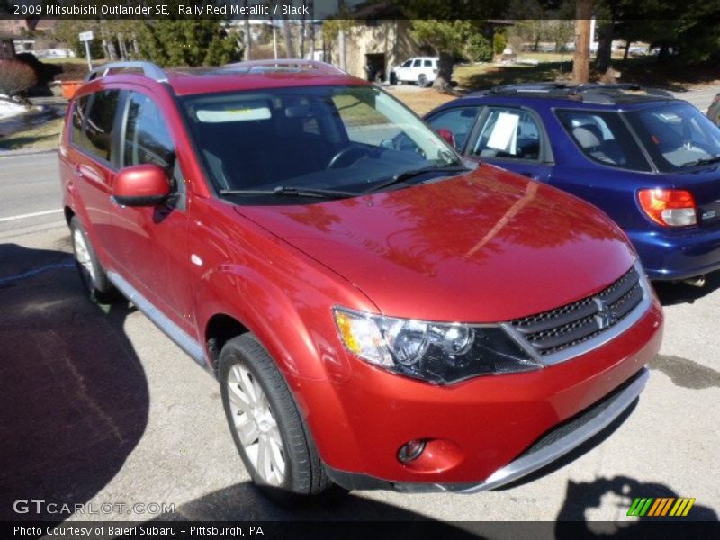 Rally Red Metallic / Black 2009 Mitsubishi Outlander SE
