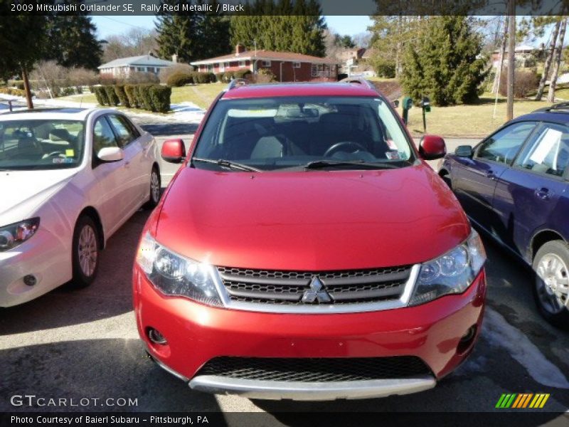 Rally Red Metallic / Black 2009 Mitsubishi Outlander SE