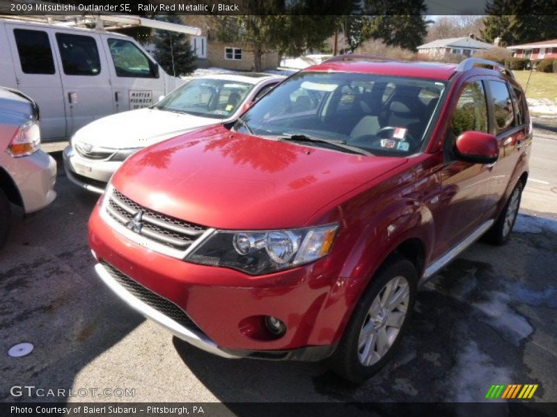 Rally Red Metallic / Black 2009 Mitsubishi Outlander SE