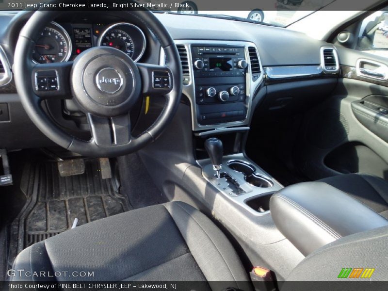 Bright Silver Metallic / Black 2011 Jeep Grand Cherokee Laredo