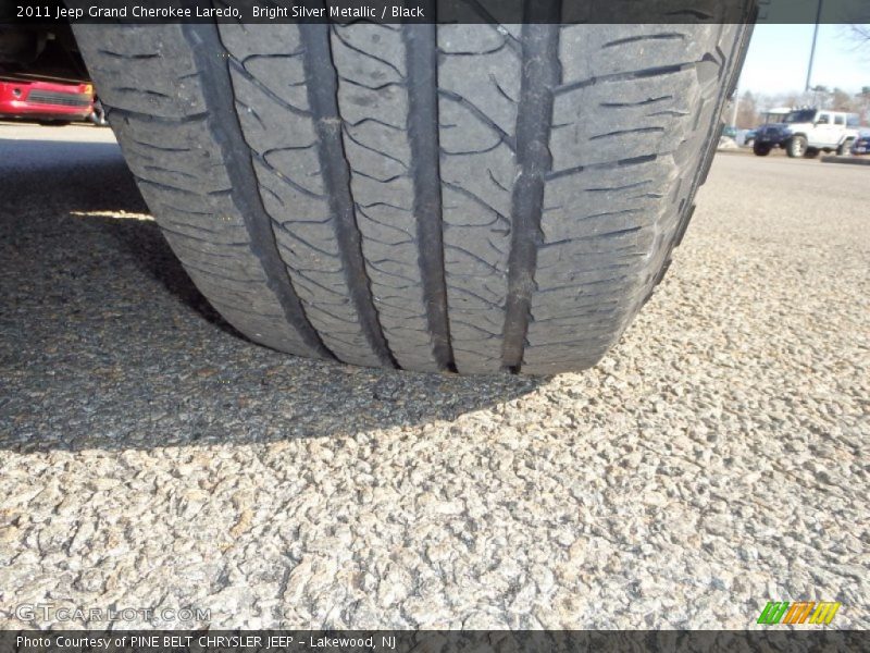 Bright Silver Metallic / Black 2011 Jeep Grand Cherokee Laredo
