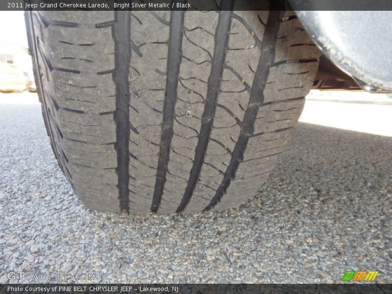 Bright Silver Metallic / Black 2011 Jeep Grand Cherokee Laredo