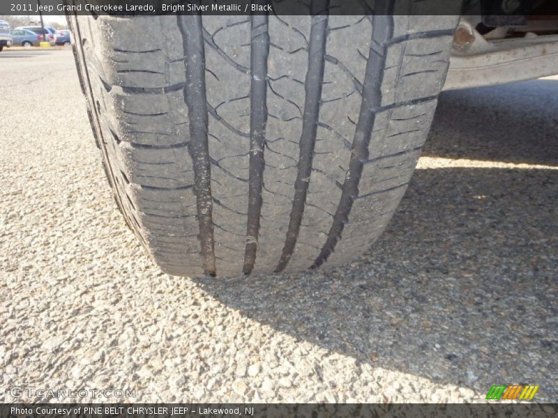 Bright Silver Metallic / Black 2011 Jeep Grand Cherokee Laredo