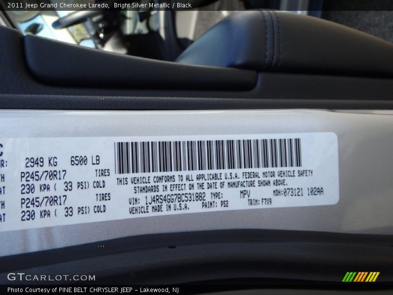 Bright Silver Metallic / Black 2011 Jeep Grand Cherokee Laredo