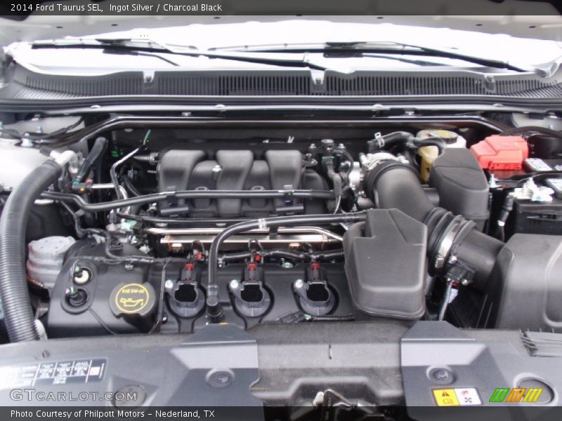 Ingot Silver / Charcoal Black 2014 Ford Taurus SEL