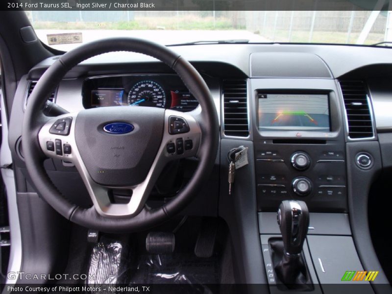Ingot Silver / Charcoal Black 2014 Ford Taurus SEL