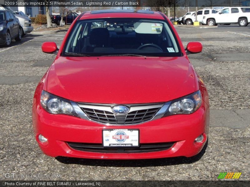 Lightning Red / Carbon Black 2009 Subaru Impreza 2.5i Premium Sedan