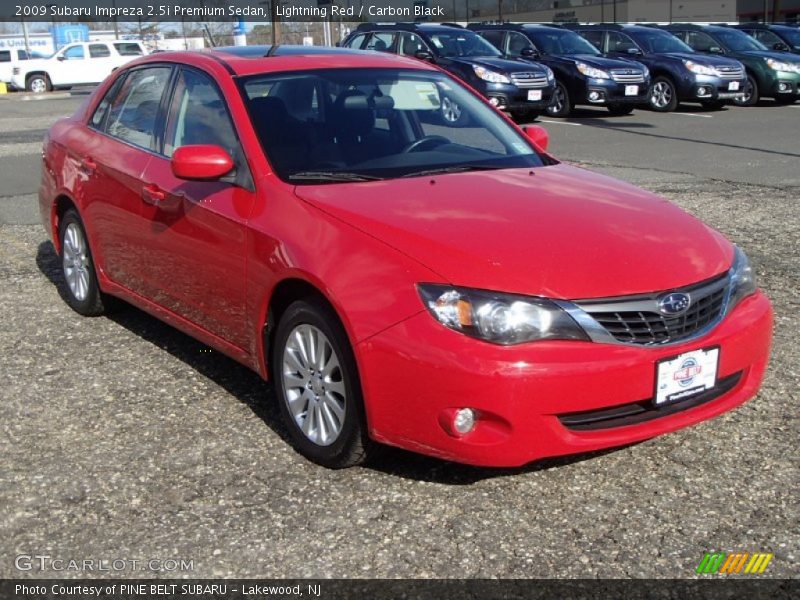 Lightning Red / Carbon Black 2009 Subaru Impreza 2.5i Premium Sedan