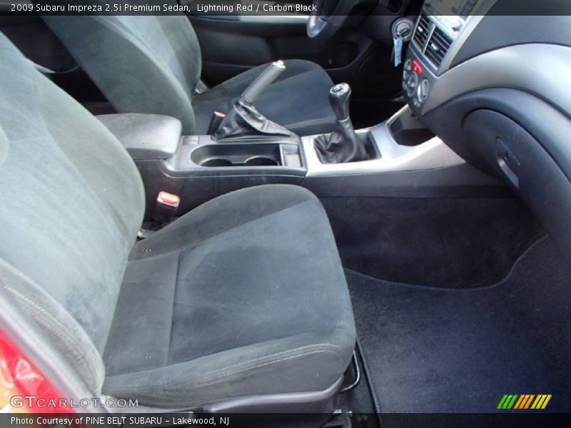 Lightning Red / Carbon Black 2009 Subaru Impreza 2.5i Premium Sedan